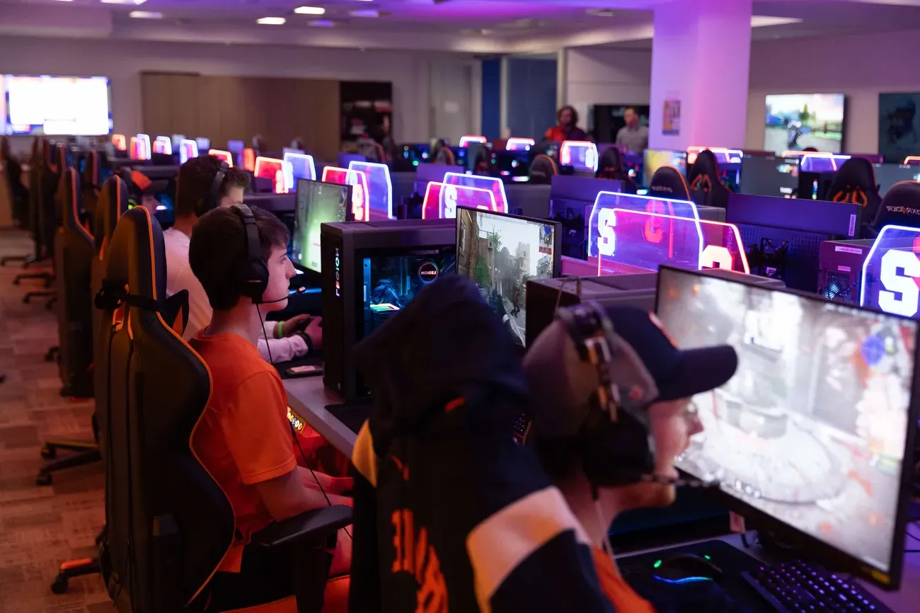 Students in Esports room in row of gaming.