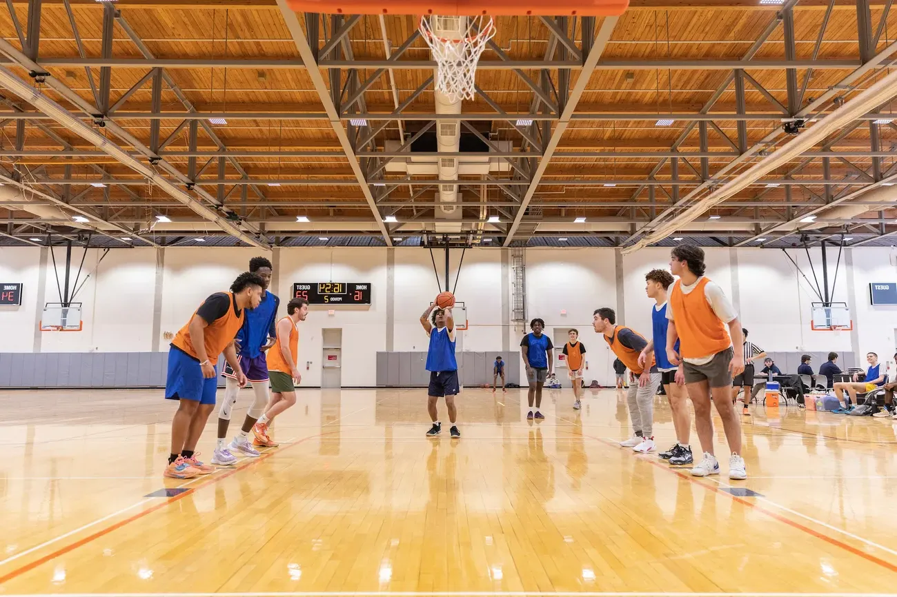 Students play an intramural basketball game.