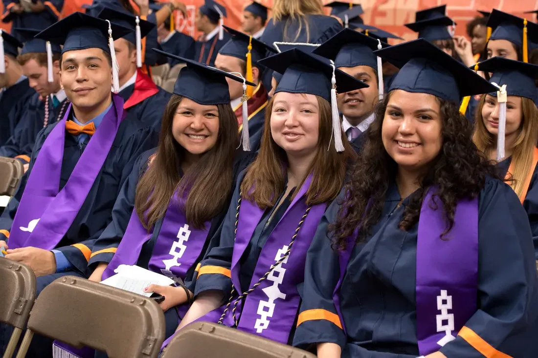 Native American students graduate.